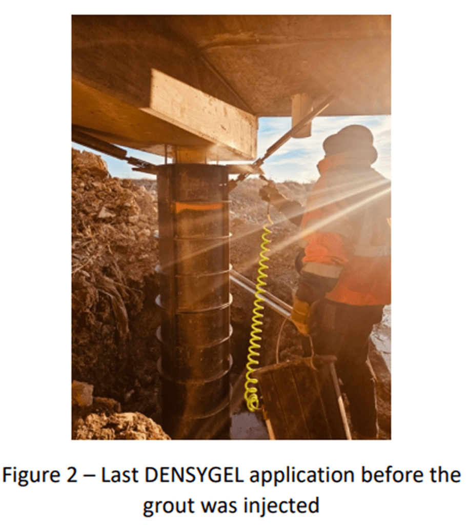 Worker applying LAST DENSYGEL with sunlight streaming in.